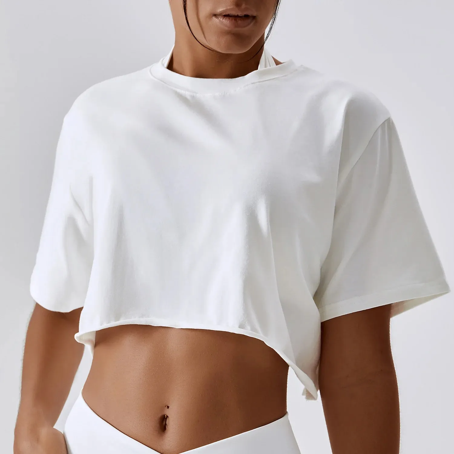 NCLAGEN Short Sleeve Crop Top